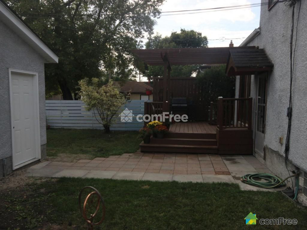 Outdoor deck and stone patio