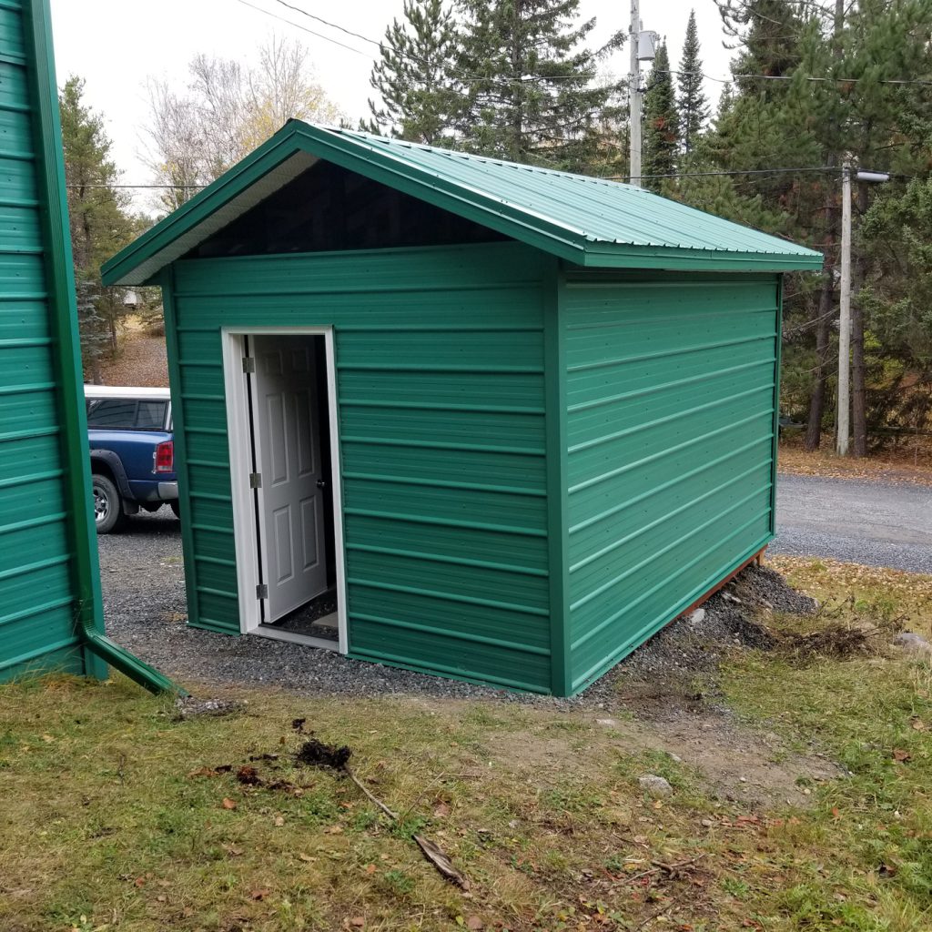 entrance side view of finished diesel enclosure with door open