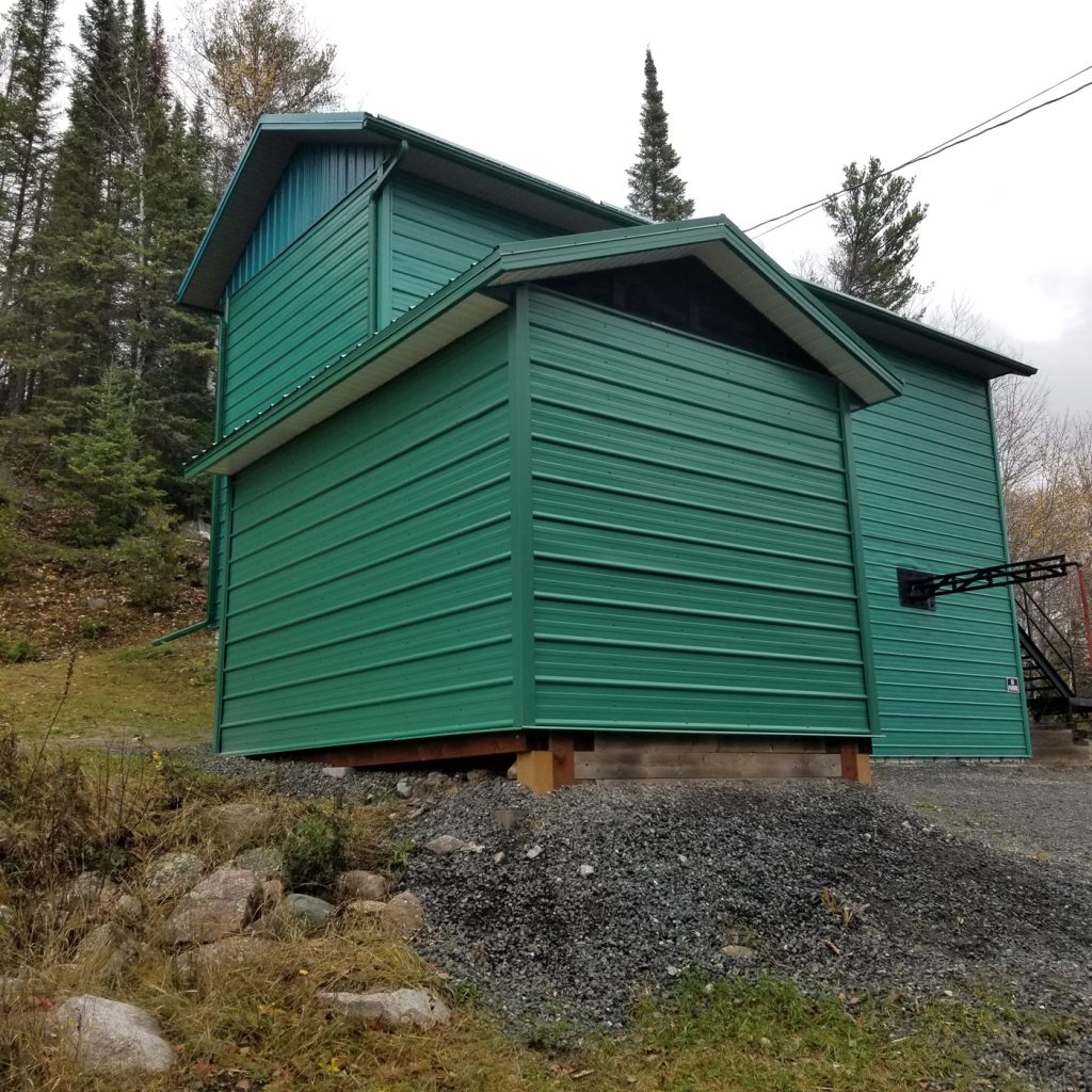 Street side view of finished diesel enclosure