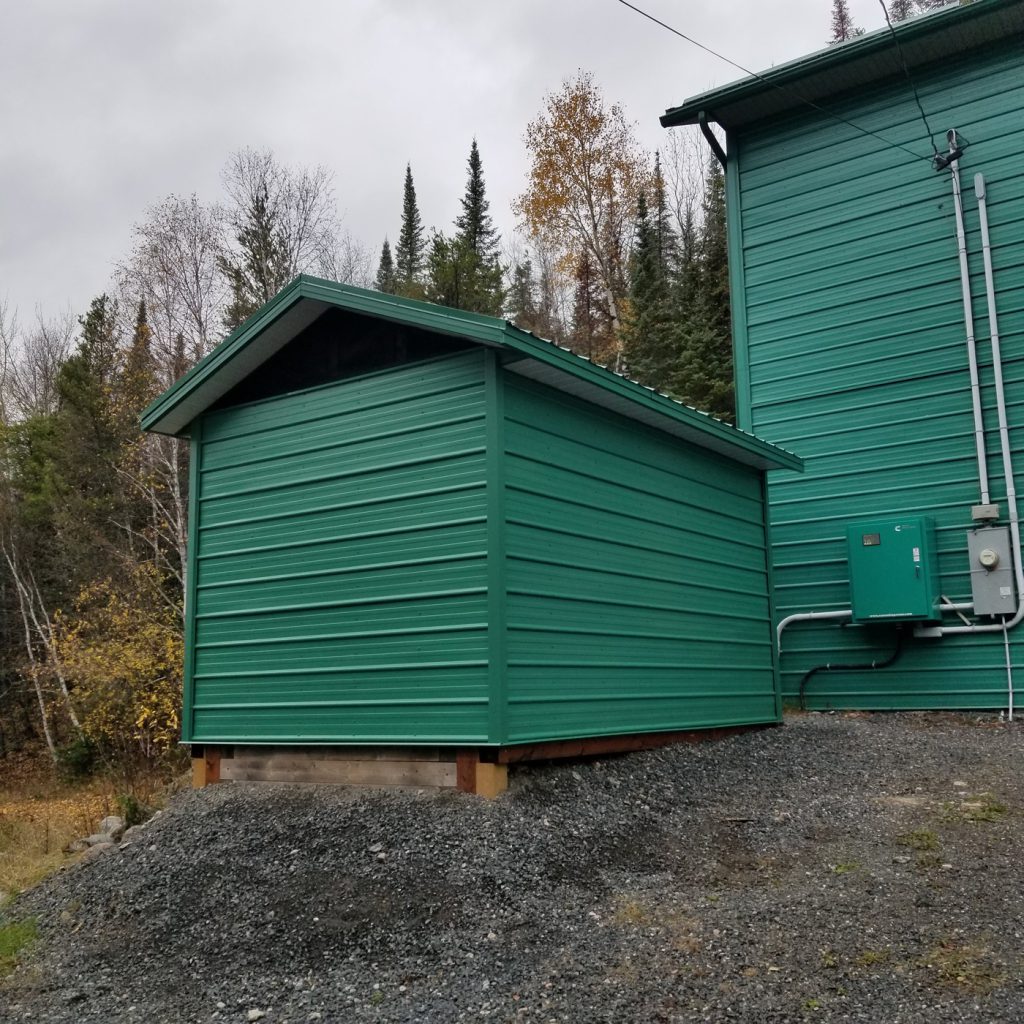 Street side view of finished diesel enclosure