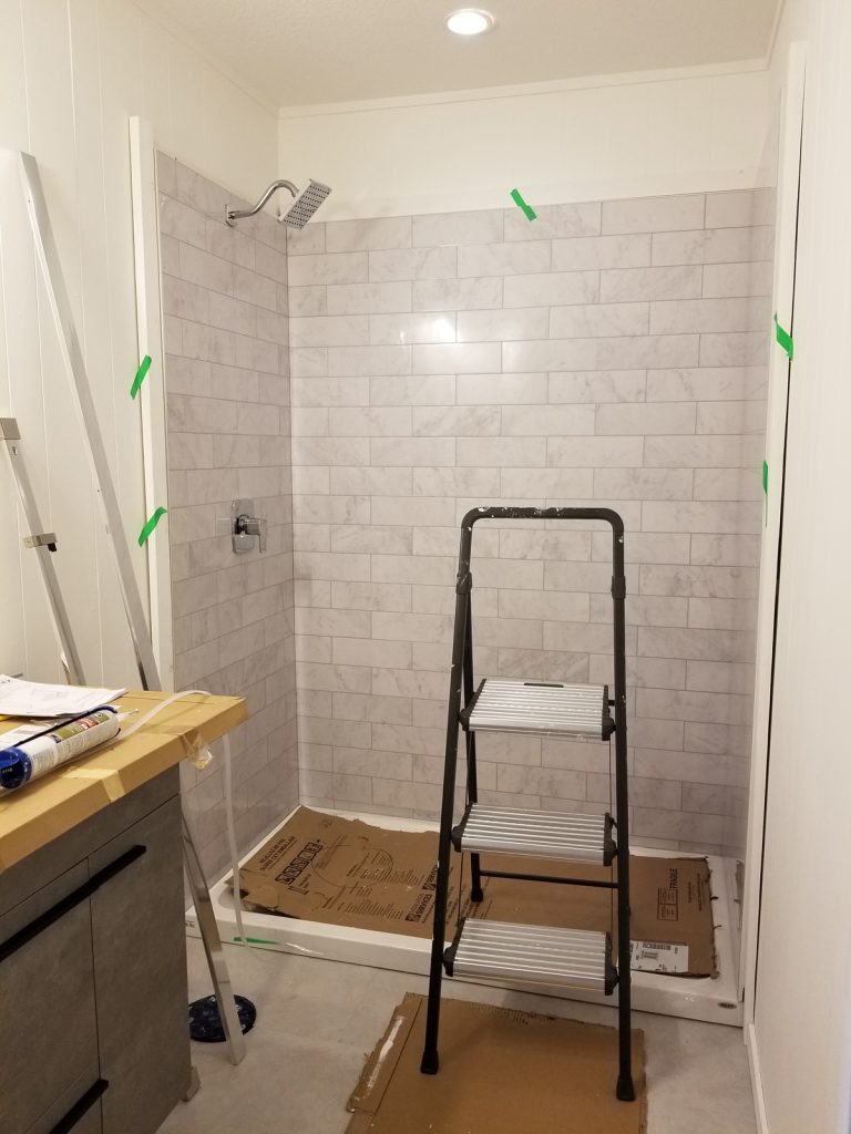 bathroom renovation and plank floor installation