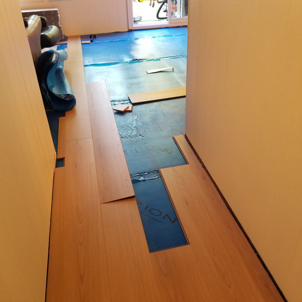 bathroom renovation and plank floor installation