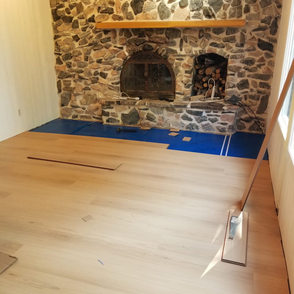 bathroom renovation and plank floor installation